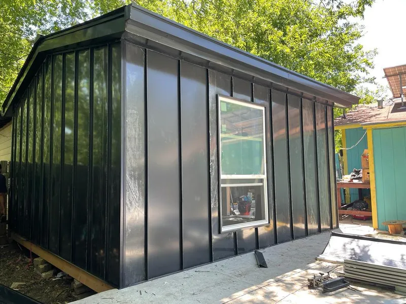 Black standing seam metal wall panels for Roof Inspection in East Los Angeles