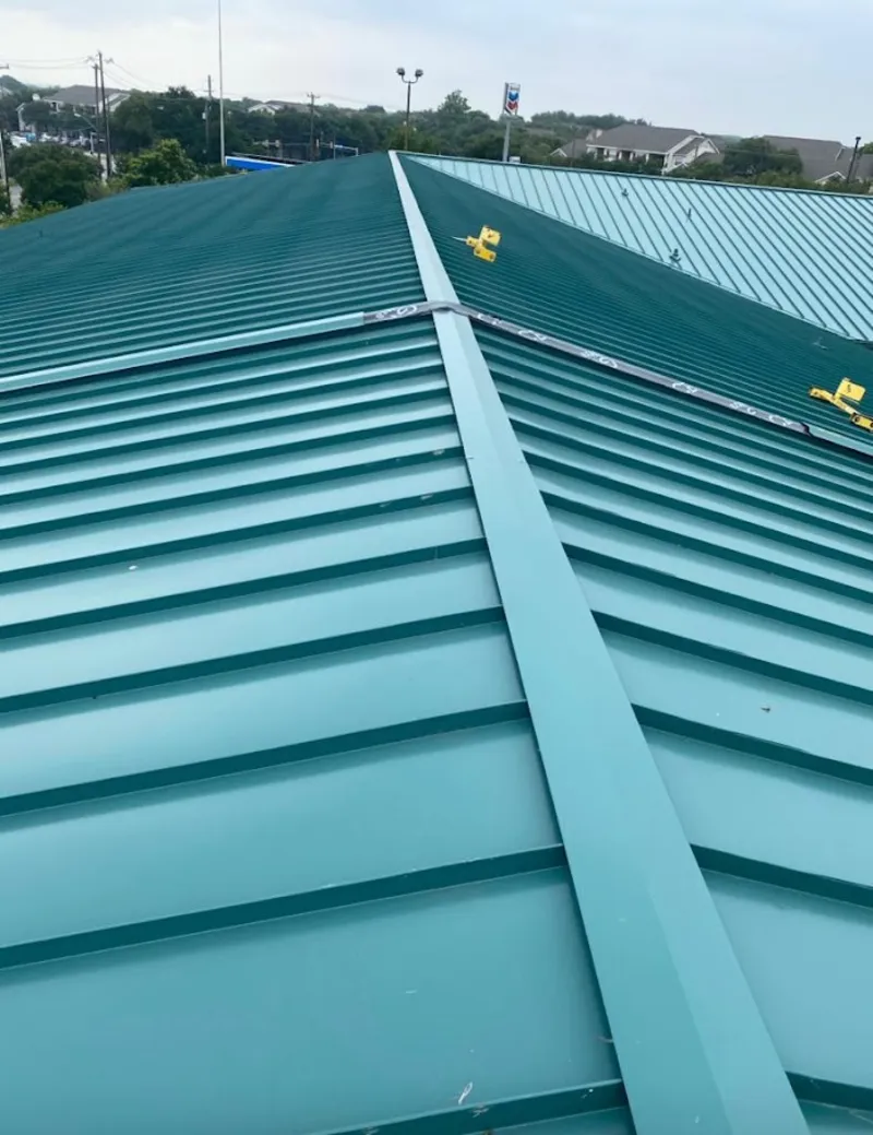 Green commercial metal roof ridge and valley for Metal Roof Repair in East Los Angeles